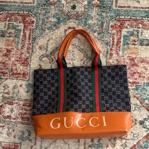 Fashion, I repeat, fashion bag !!!Gucci Orange and Blue Logo Tote